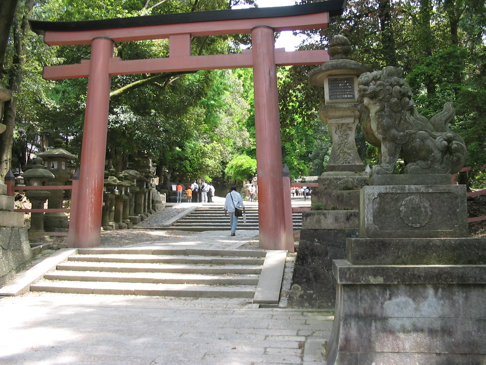 large torri gate in front of shrine entrance