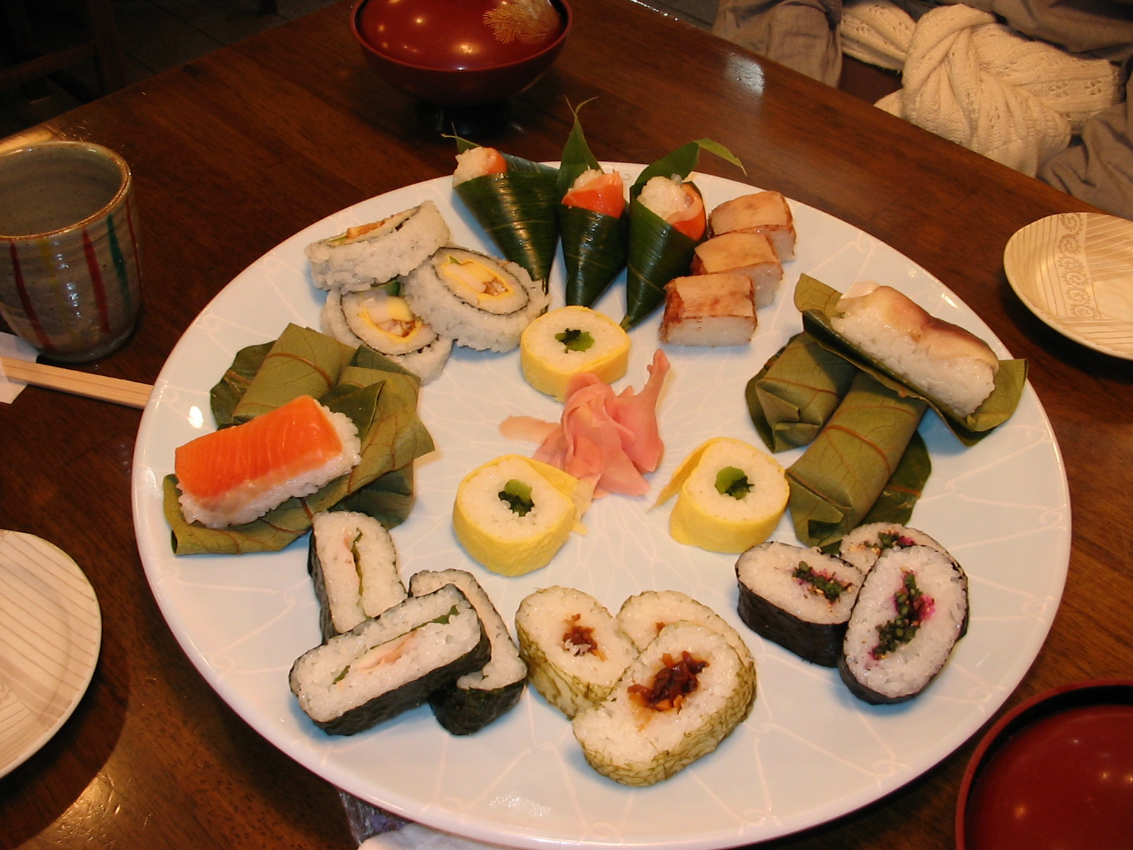 plate full of sushi at restaurant