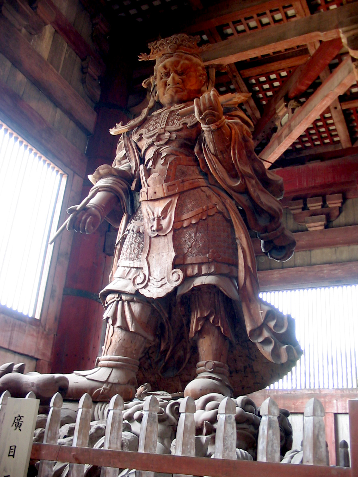 large wooden statue of man