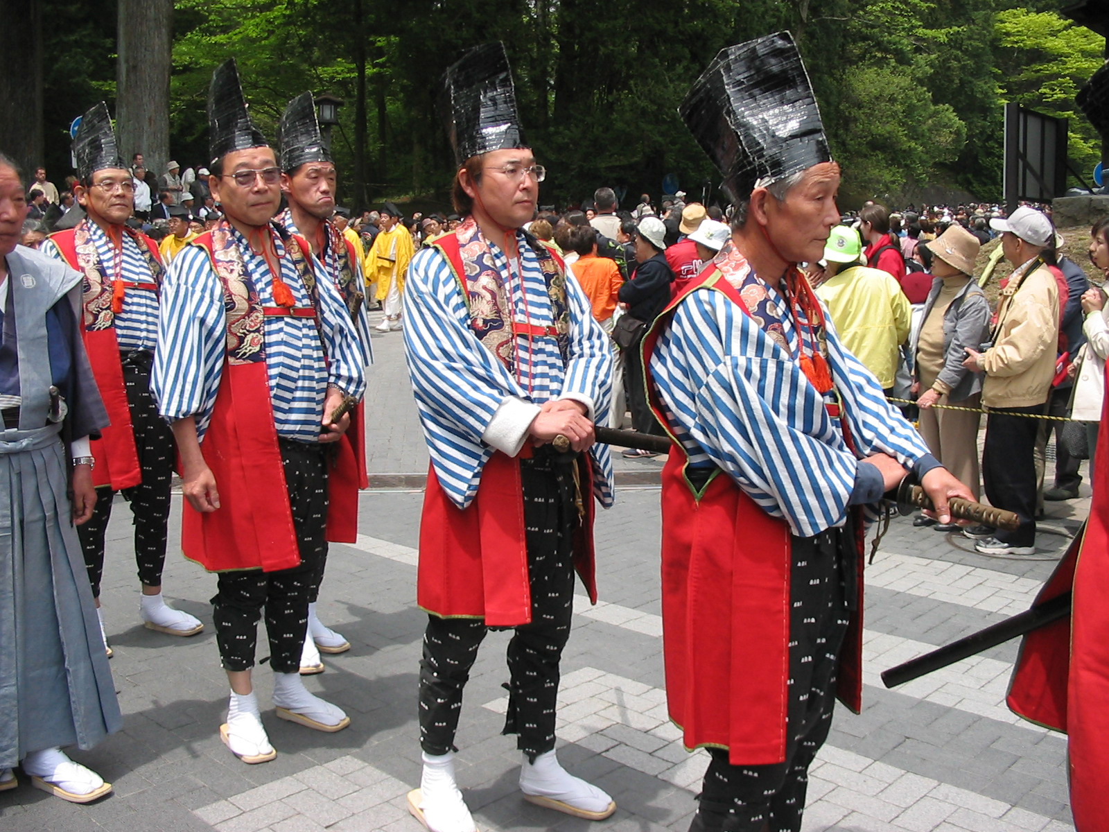 men in tradtional garb and tall black hats
