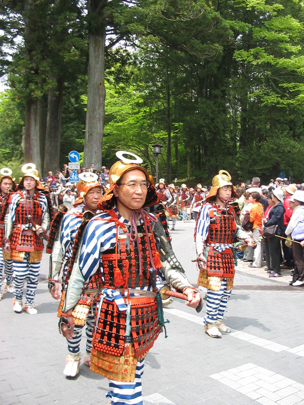 men in parade in traditional clothing