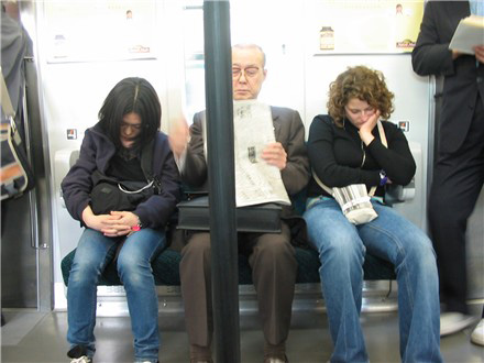 people sleeping on subway